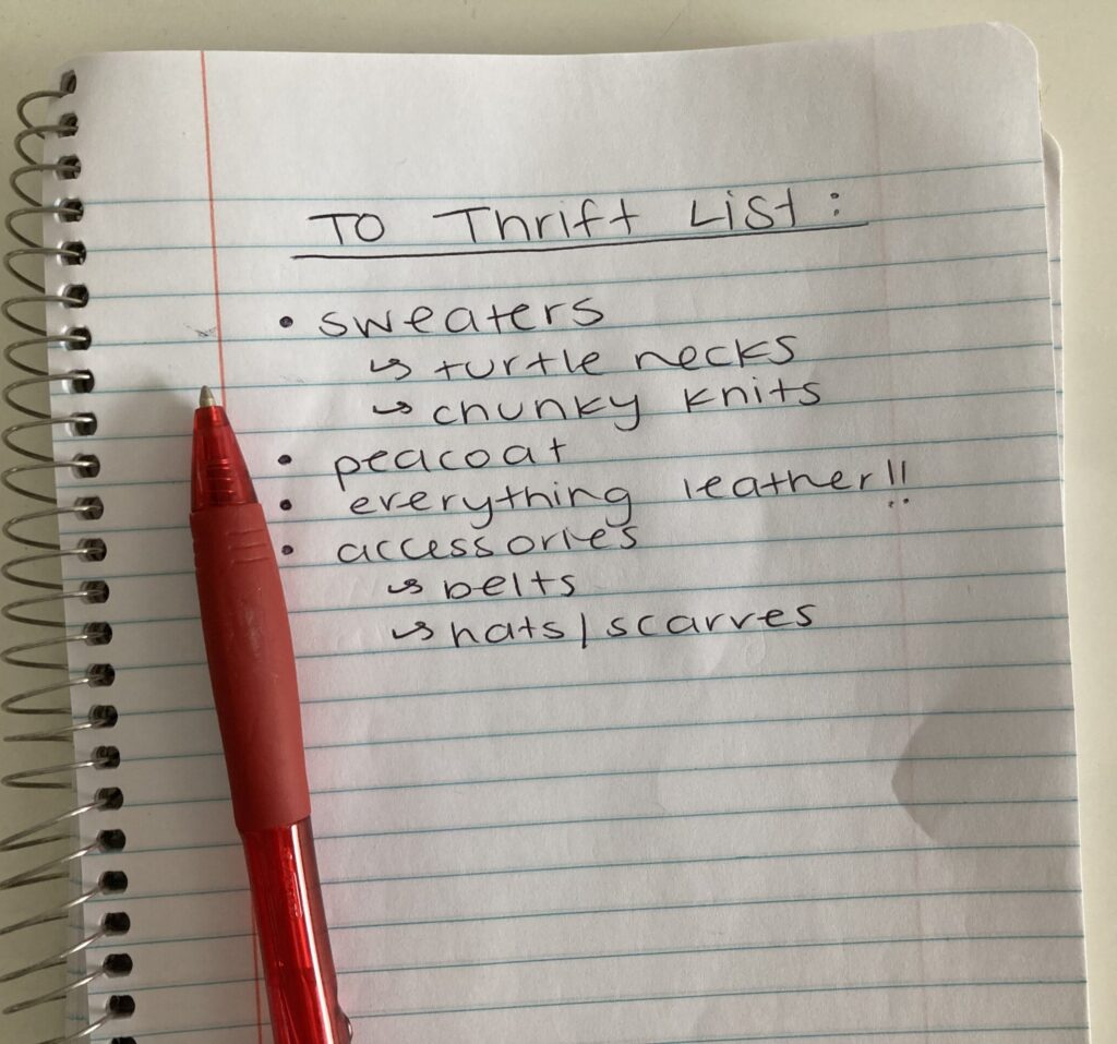 notebook with a list of items to thrift